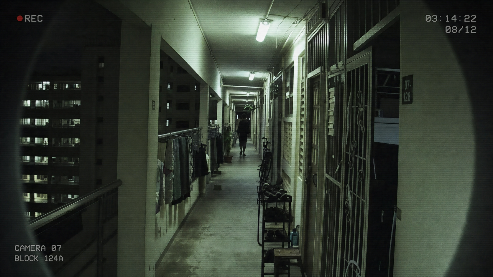 CCTV still frame from the residential block corridor